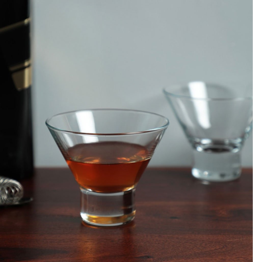 HISTORY COMPANY - The perfect stemless martini glass set, blending mid-century sculptural elegance with modern mixology.