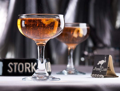 HISTORY COMPANY - Elegant 1942 Stork Club Coupe Glasses, a 2-piece set crafted for classic champagne and cocktail elegance. 